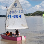 Junior sailors in their boat